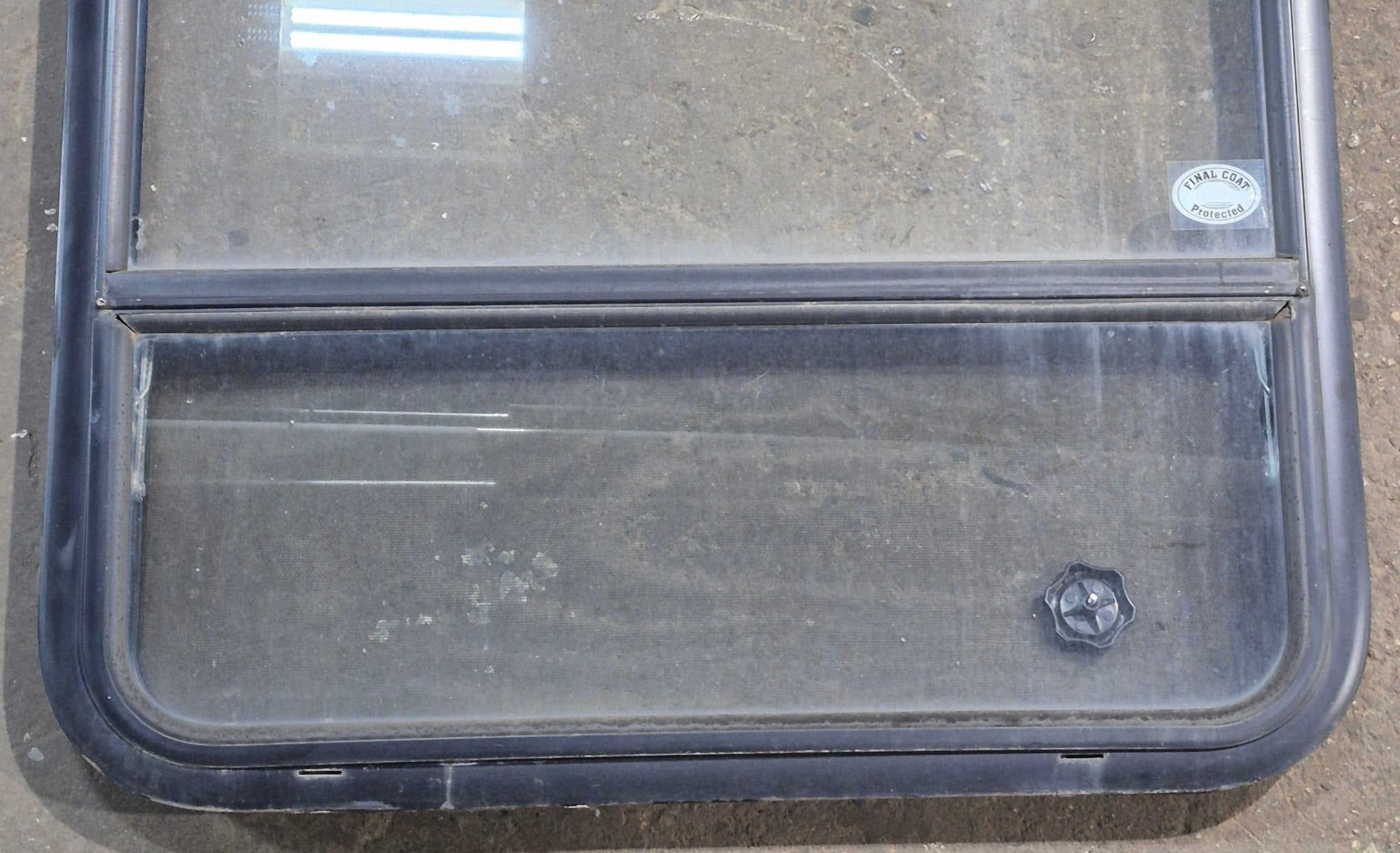 Used Black Radius Opening Window : 29 1/4" W x 34 1/2" H x 1 7/8" D - Young Farts RV Parts