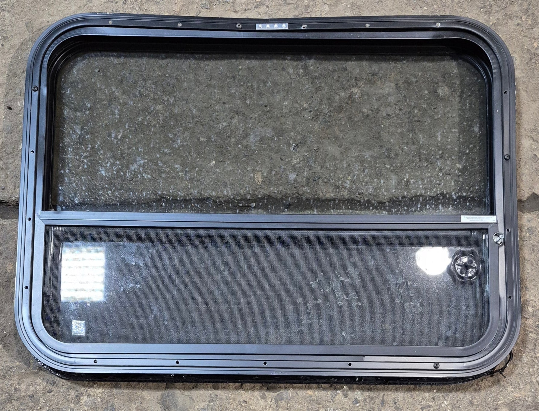 Used Black Radius Opening Window : 29 3/4" W x 21 1/2" H x 1 3/4" - Young Farts RV Parts