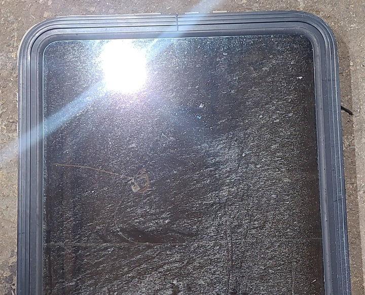 Used Black Radius Opening Window : 29" W x 39 1/2" H x 1 3/4" D - Young Farts RV Parts
