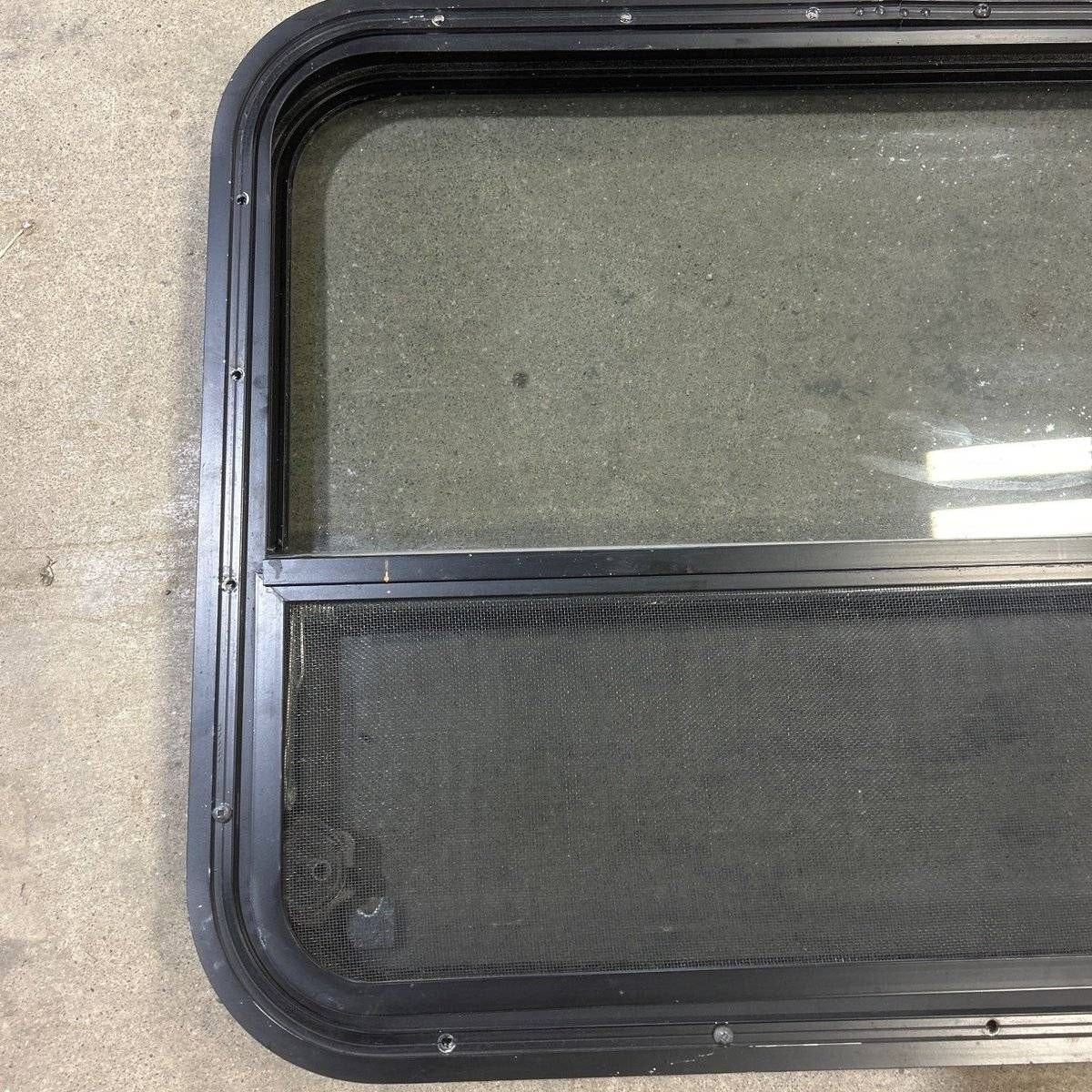 Used Black Radius Opening Window - 29.5 X 21.75 X 1.875 - Young Farts RV Parts