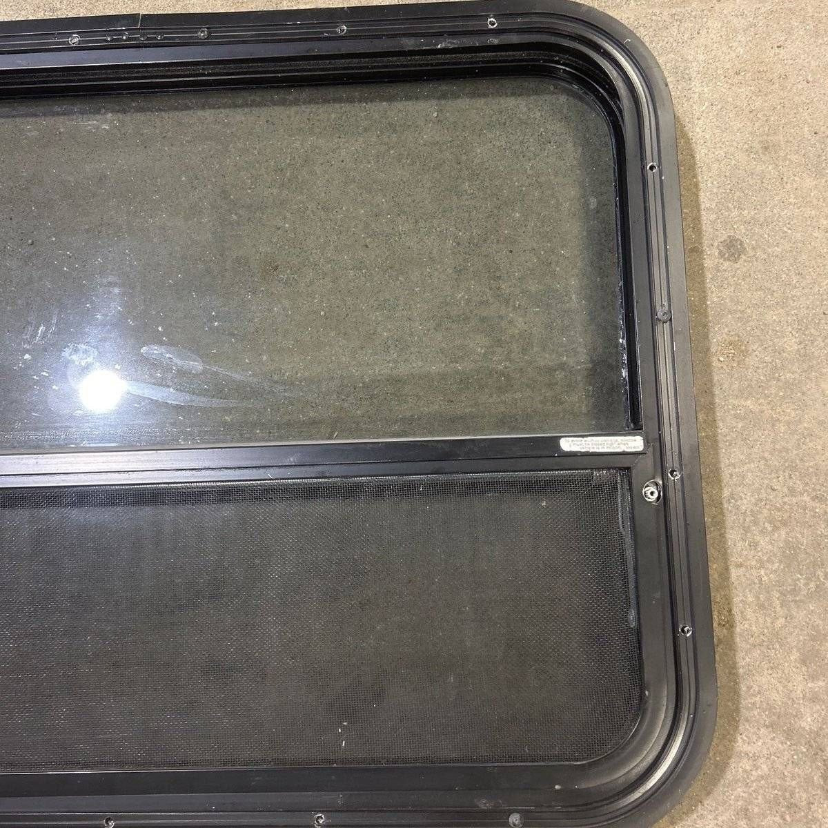 Used Black Radius Opening Window - 29.5 X 21.75 X 1.875 - Young Farts RV Parts
