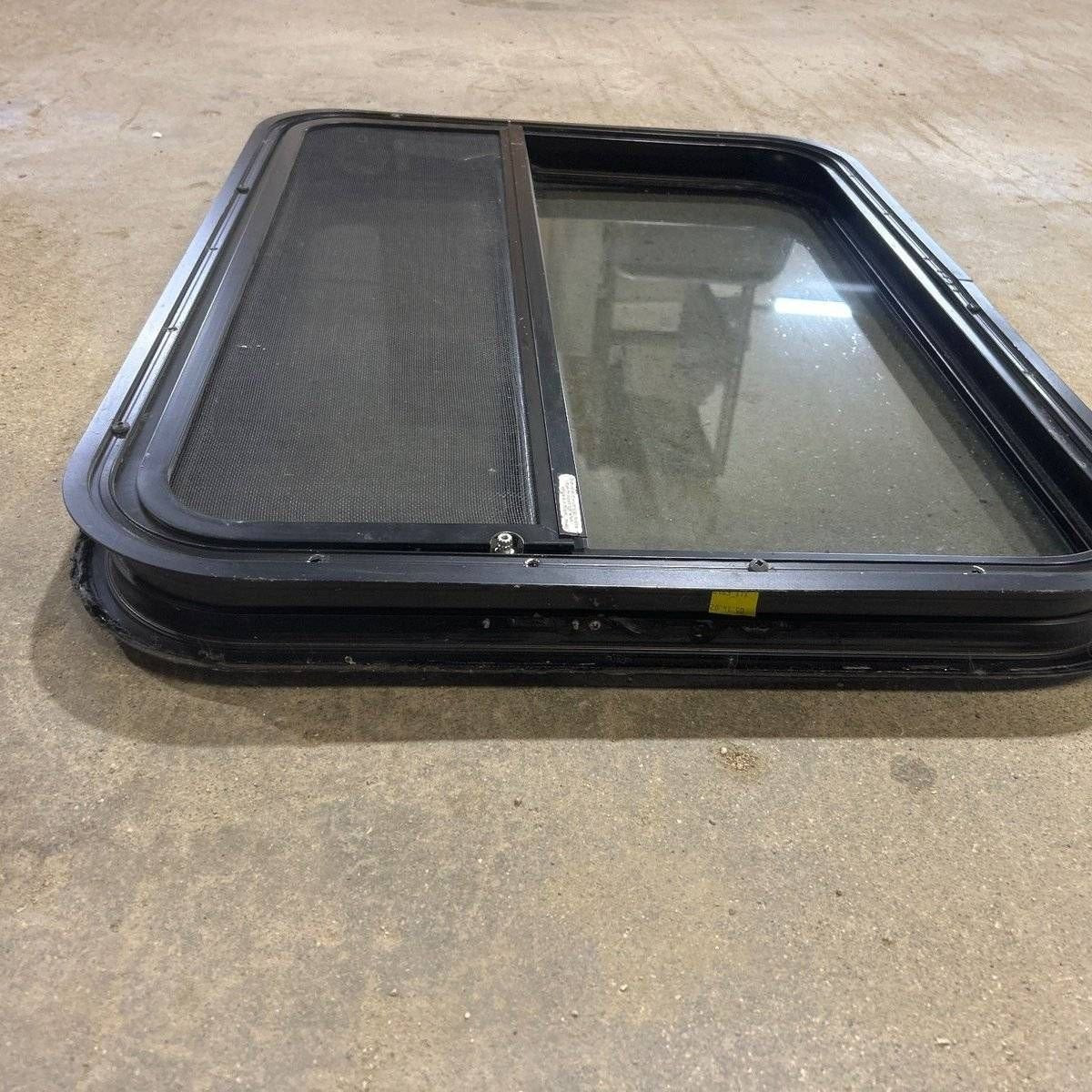 Used Black Radius Opening Window - 29.5 X 21.75 X 1.875 - Young Farts RV Parts