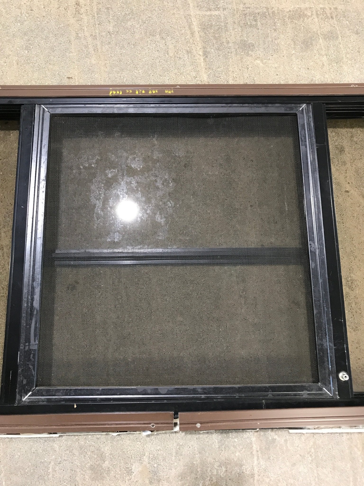 Used Black Radius Opening Window : 30 1/2" W x 18 3/4" H x 1 1/2" D - Young Farts RV Parts