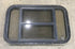 Used Black Radius Opening Window : 30 1/2" W x 18 3/4" H x 1 1/2" D - Young Farts RV Parts