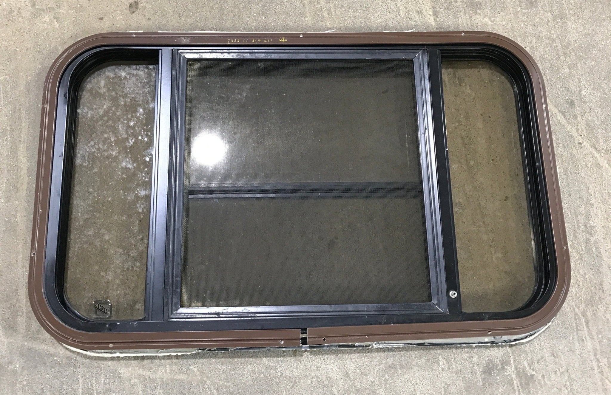 Used Black Radius Opening Window : 30 1/2" W x 18 3/4" H x 1 1/2" D - Young Farts RV Parts