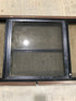Used Black Radius Opening Window : 30 1/2" W x 18 3/4" H x 1 1/2" D - Young Farts RV Parts