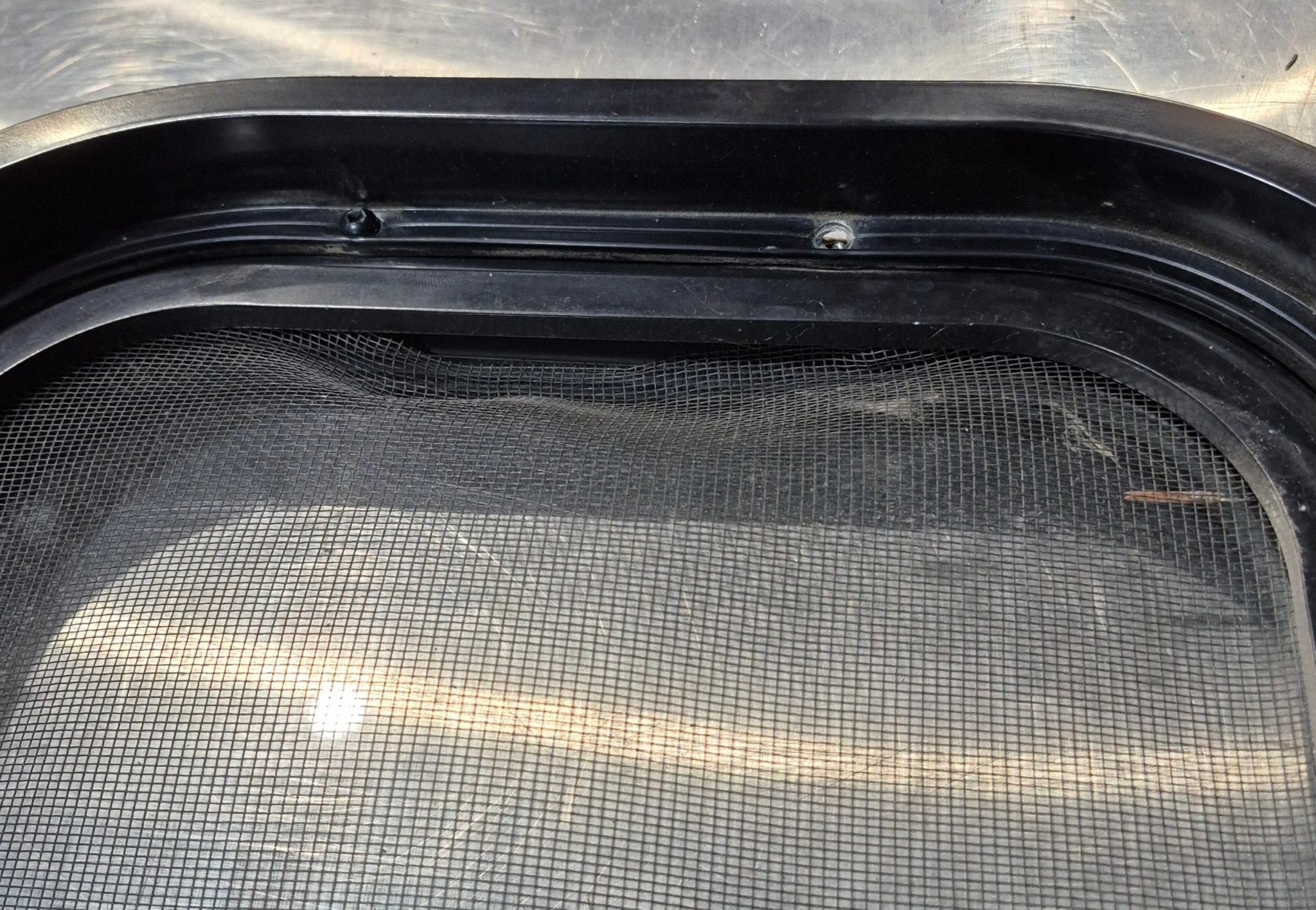 Used Black Radius Opening Window : 30 1/4" W x 11 3/4" H x 1 3/4" - Young Farts RV Parts