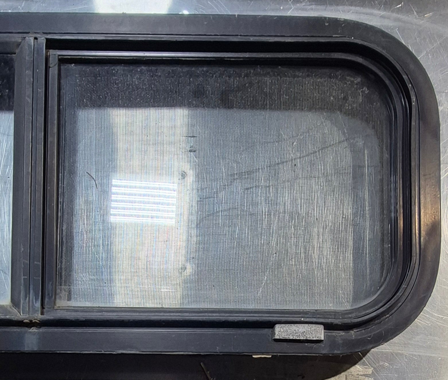 Used Black Radius Opening Window : 30 1/4" W x 11 3/4" H x 1 3/4" - Young Farts RV Parts