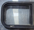 Used Black Radius Opening Window : 30 1/4" W x 11 3/4" H x 1 3/4" - Young Farts RV Parts