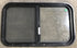 Used Black Radius Opening Window : 30 1/4" W x 17 3/4" H x 1 7/8" D - Young Farts RV Parts
