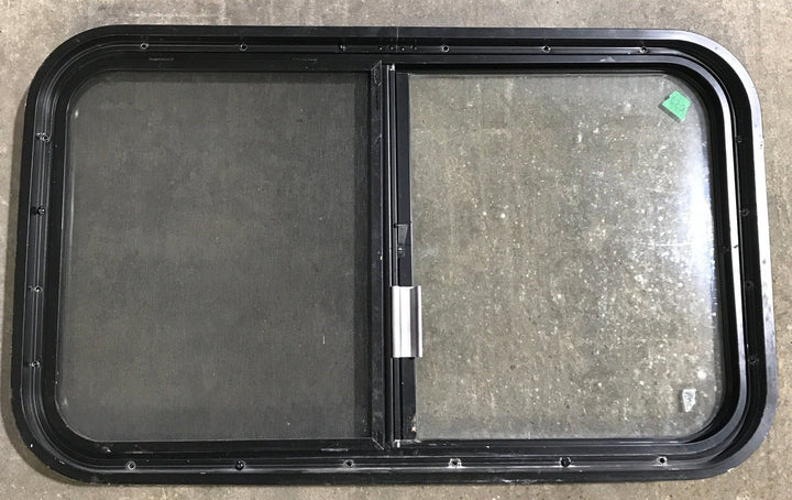 Used Black Radius Opening Window : 30 1/4" W x 17 3/4" H x 1 7/8" D - Young Farts RV Parts