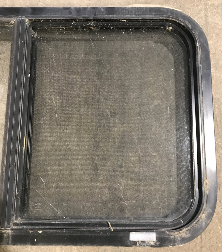 Used Black Radius Opening Window : 30 1/4" W x 17 3/4" H x 1 7/8" D - Young Farts RV Parts