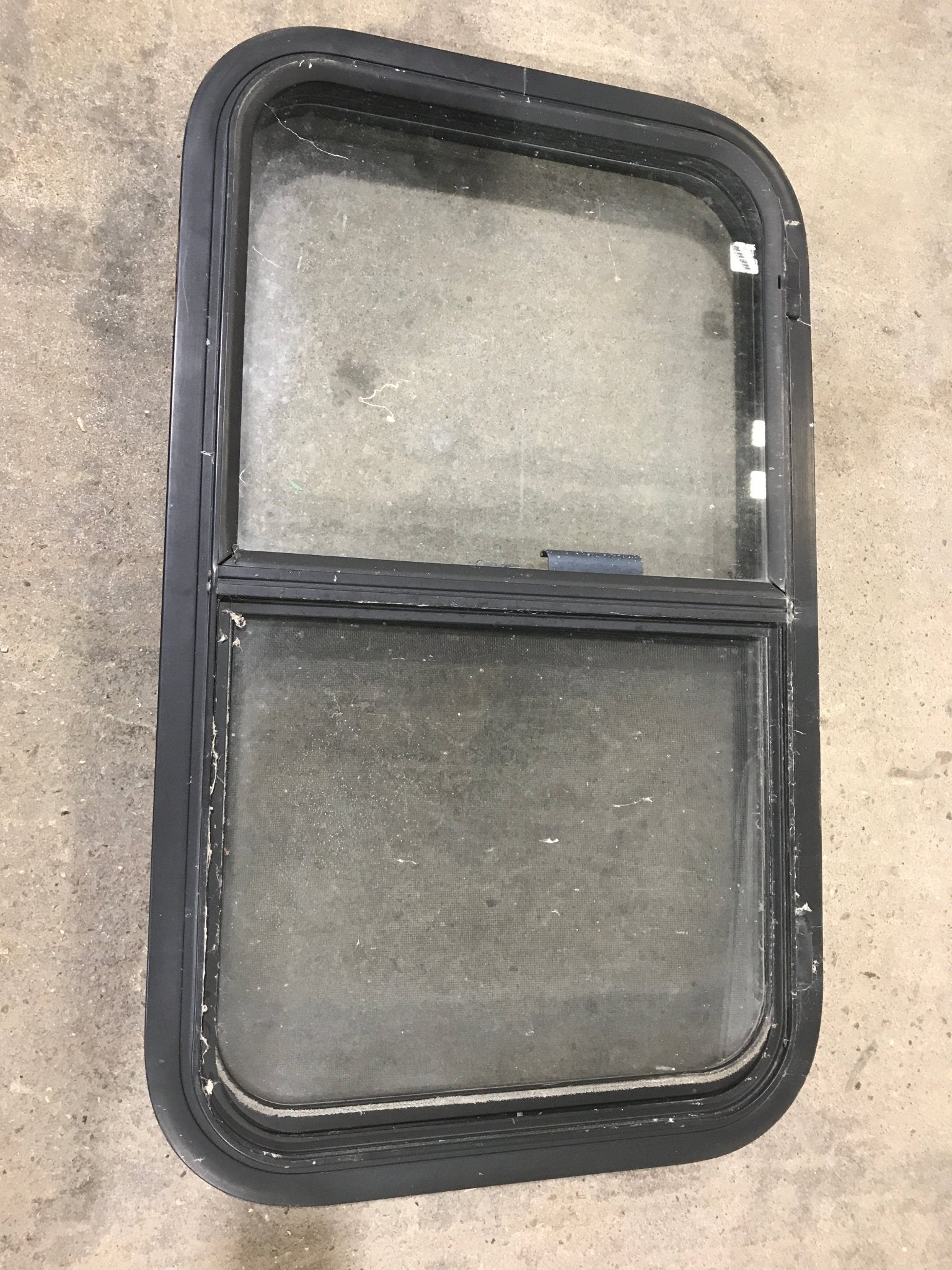 Used Black Radius Opening Window : 30 3/4" W X 18 1/2" H X 2" D - Young Farts RV Parts
