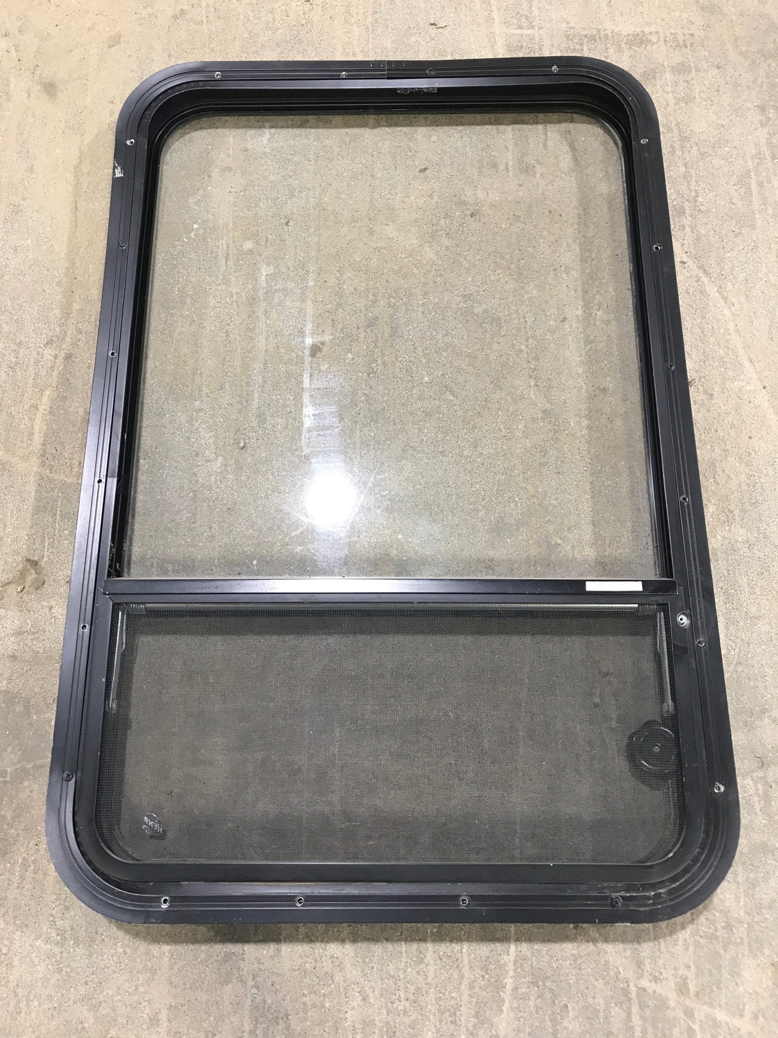 Used Black Radius Opening Window : 34 3/4" W x 23 1/4" H x 2" D - Young Farts RV Parts