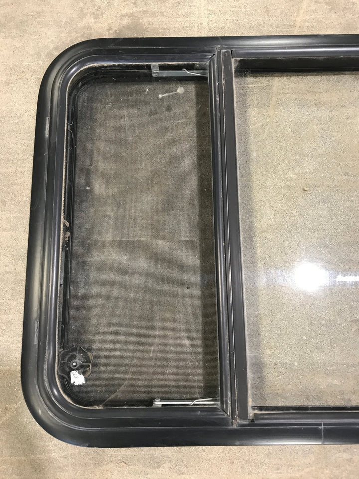 Used Black Radius Opening Window : 34 3/4" W x 23 1/4" H x 2" D - Young Farts RV Parts