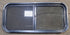 Used Black Radius Opening Window : 35 1/2" W x 15 3/4" H x 2" D - Young Farts RV Parts