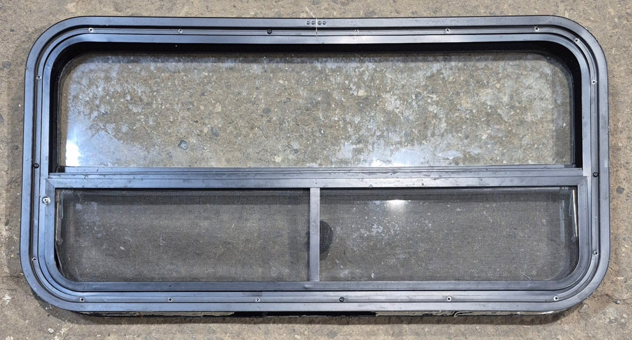 Used Black Radius Opening Window : 35 1/2" W x 17 1/4" H x 1 7/8" - Young Farts RV Parts