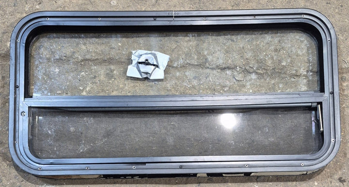 Used Black Radius Opening Window : 35 1/2" W x 17 1/4" H x 1 7/8" - Young Farts RV Parts