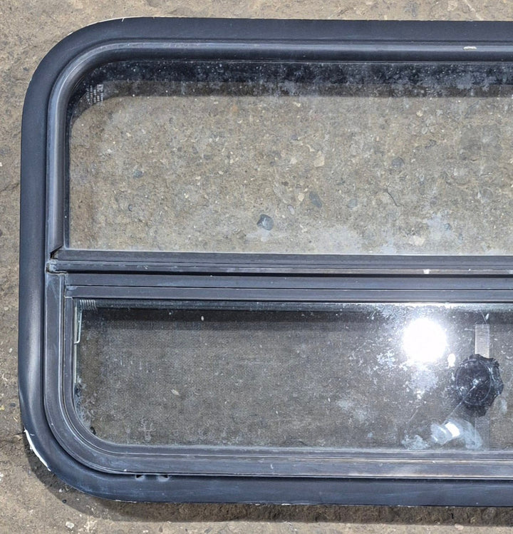 Used Black Radius Opening Window : 35 1/2" W x 17 1/4" H x 1 7/8" - Young Farts RV Parts