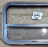 Used Black Radius Opening Window : 35 1/2" W x 17 1/4" H x 1 7/8" - Young Farts RV Parts