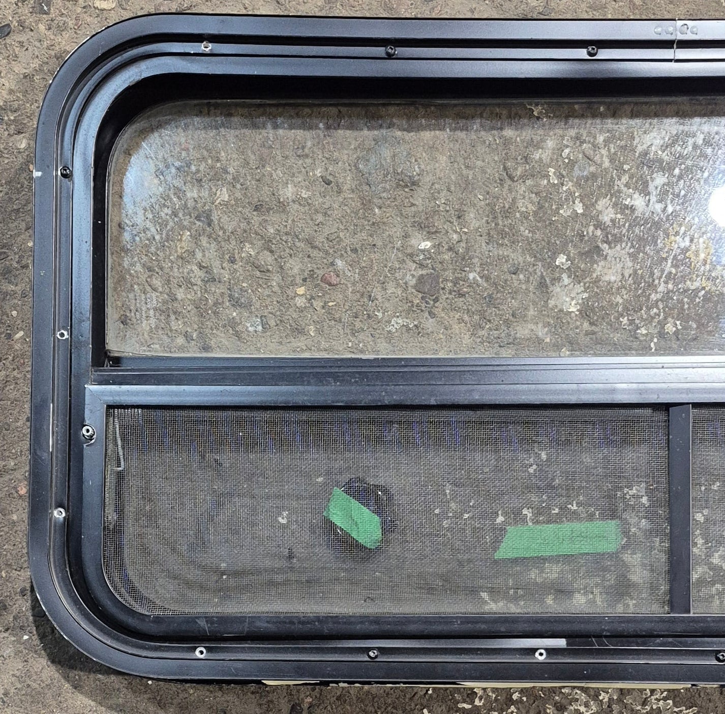 Used Black Radius Opening Window : 35 1/2" W x 17 1/4" H x 1 7/8" - Young Farts RV Parts