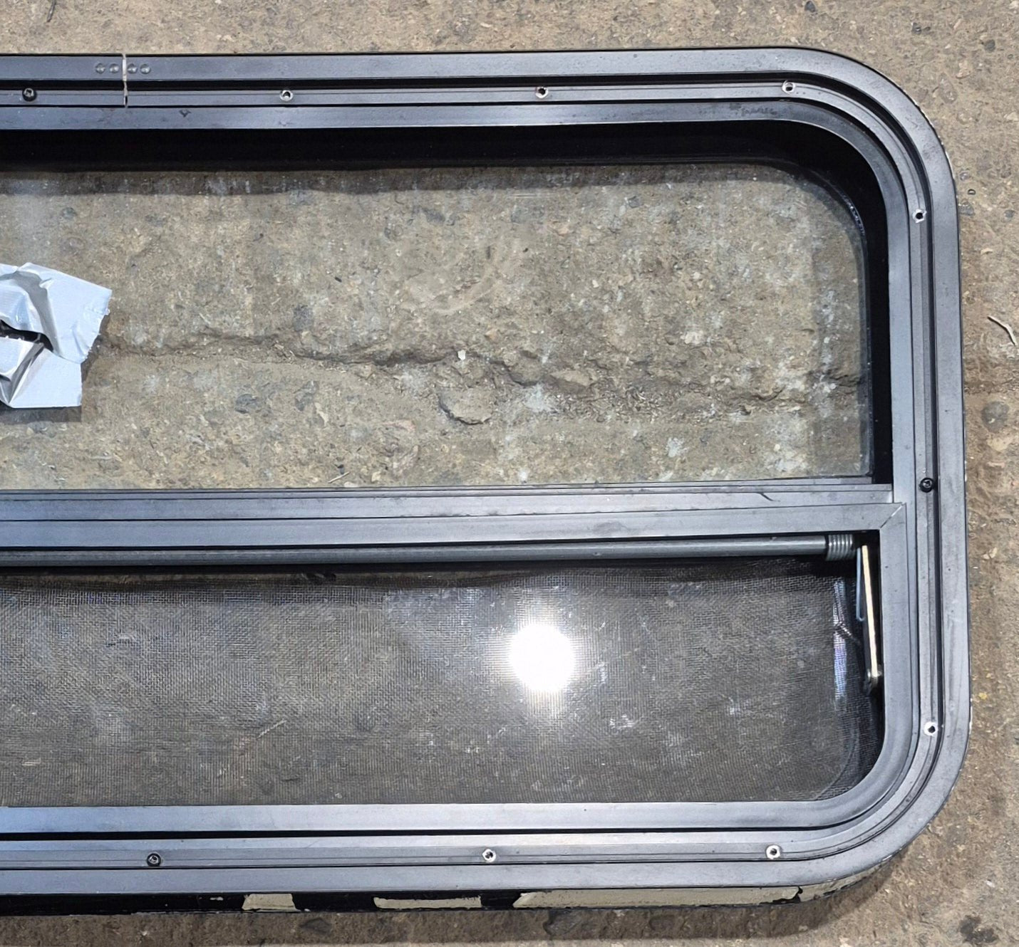 Used Black Radius Opening Window : 35 1/2" W x 17 1/4" H x 1 7/8" - Young Farts RV Parts
