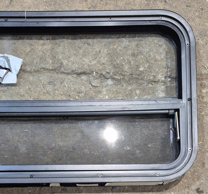 Used Black Radius Opening Window : 35 1/2" W x 17 1/4" H x 1 7/8" - Young Farts RV Parts