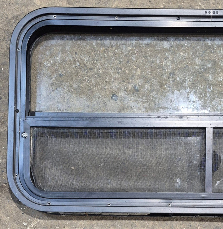 Used Black Radius Opening Window : 35 1/2" W x 17 1/4" H x 1 7/8" - Young Farts RV Parts