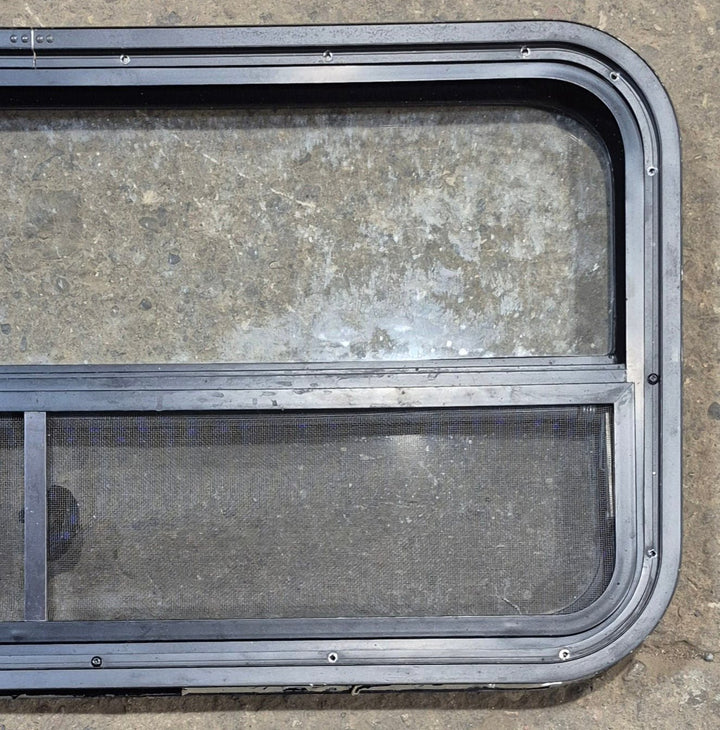 Used Black Radius Opening Window : 35 1/2" W x 17 1/4" H x 1 7/8" - Young Farts RV Parts