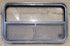 Used Black Radius Opening Window : 35 1/2" W x 21 1/2" H x 1 7/8" - Young Farts RV Parts