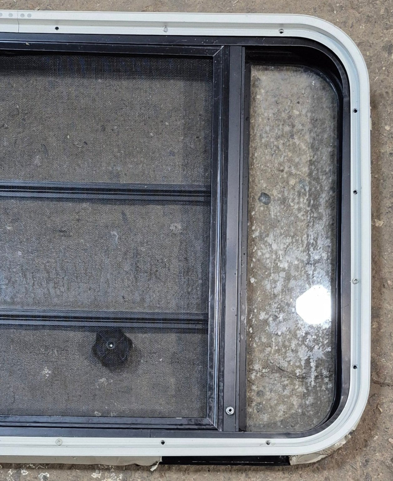 Used Black Radius Opening Window : 35 1/2" W x 21 3/4" H x 1 7/8" - Young Farts RV Parts