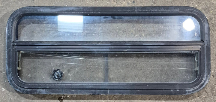 Used Black Radius Opening Window : 35 1/4" W x 14 1/4" H x 1 7/8" - Young Farts RV Parts