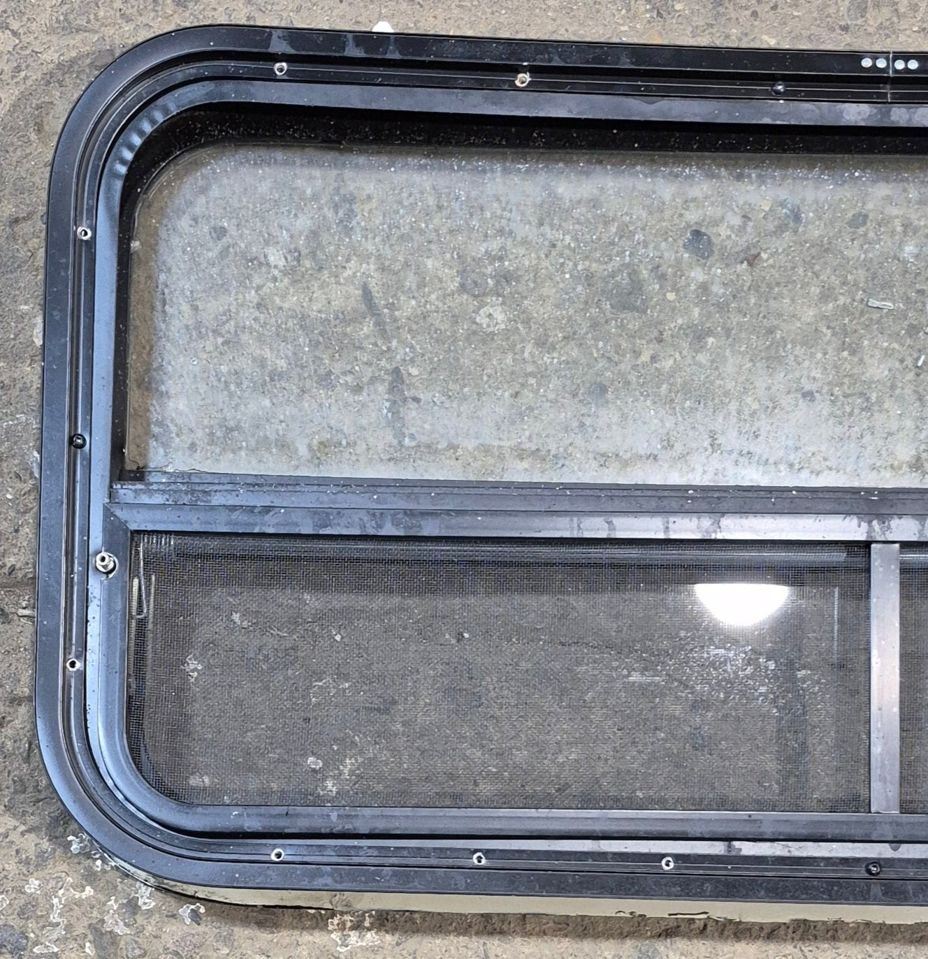 Used Black Radius Opening Window : 35 1/4" W x 17 1/4" H x 1 7/8" - Young Farts RV Parts