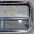 Used Black Radius Opening Window : 35 1/4" W x 17 1/4" H x 1 7/8" - Young Farts RV Parts