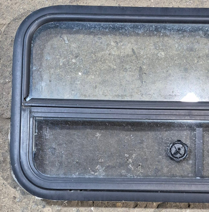 Used Black Radius Opening Window : 35 1/4" W x 17 1/4" H x 1 7/8" - Young Farts RV Parts
