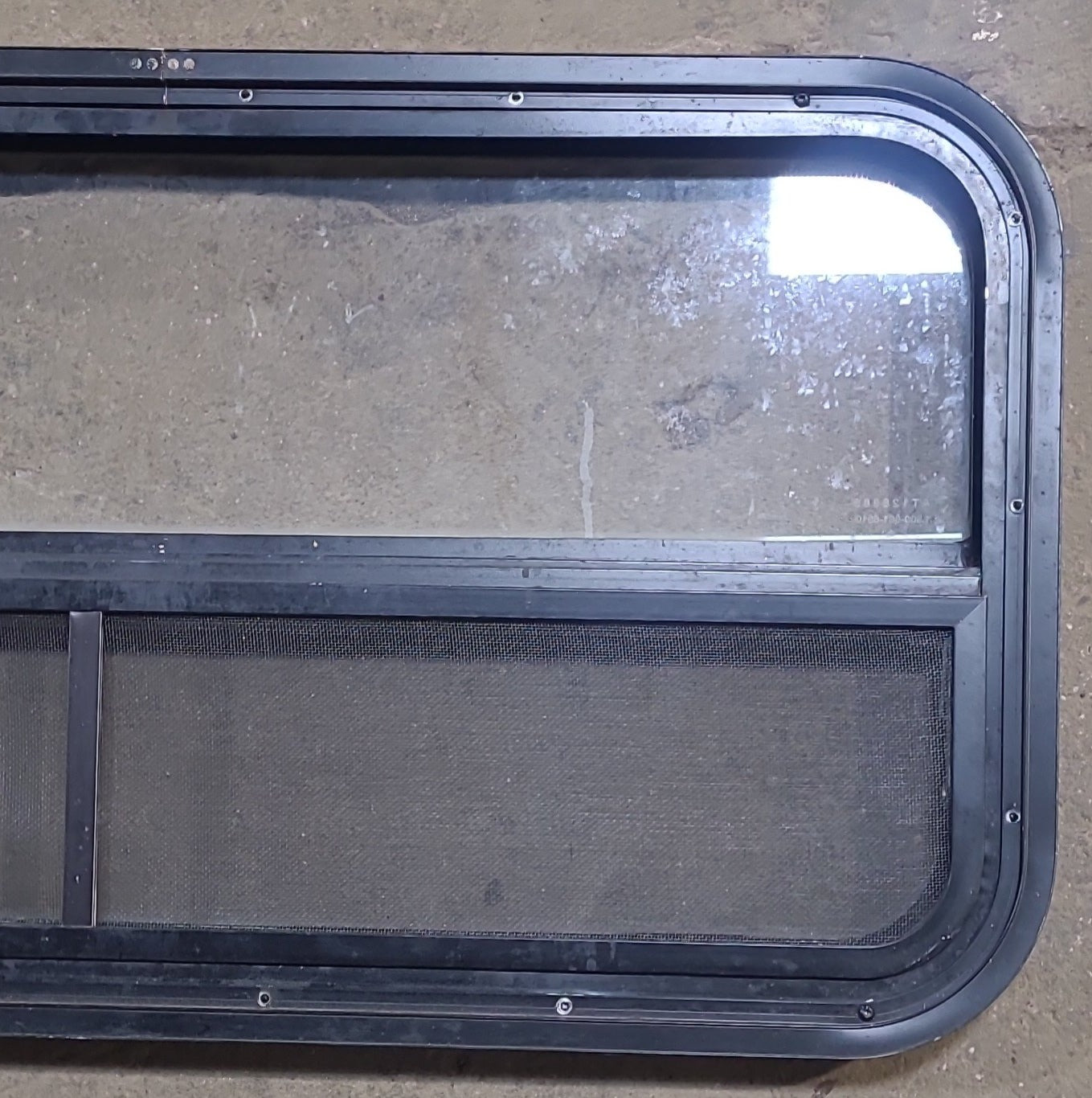 Used Black Radius Opening Window : 35 1/4" W x 17 1/4" H x 1 7/8" D - Young Farts RV Parts