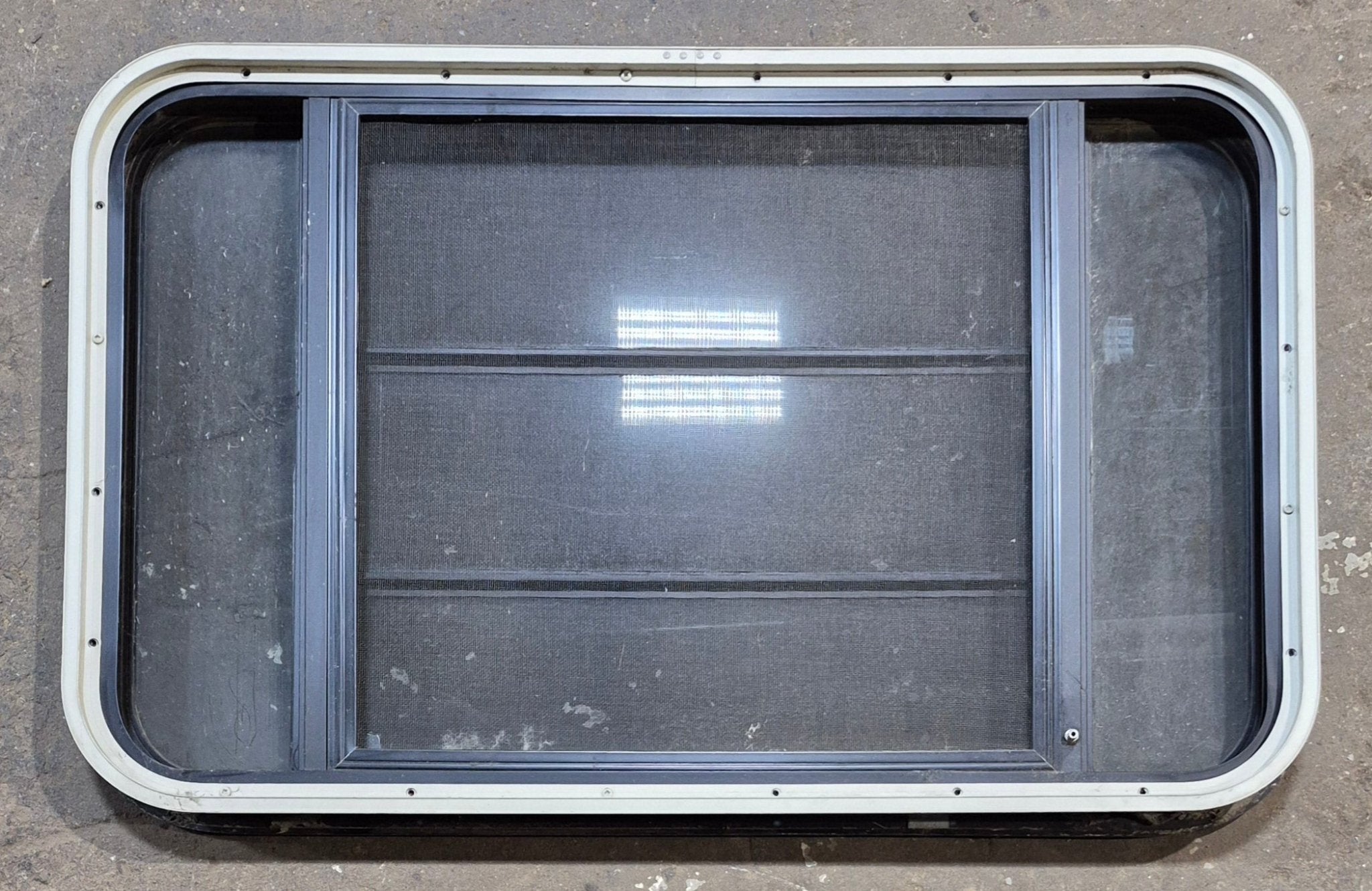 Used Black Radius Opening Window : 35 1/4" W x 21 1/2" H x 1 7/8" - Young Farts RV Parts