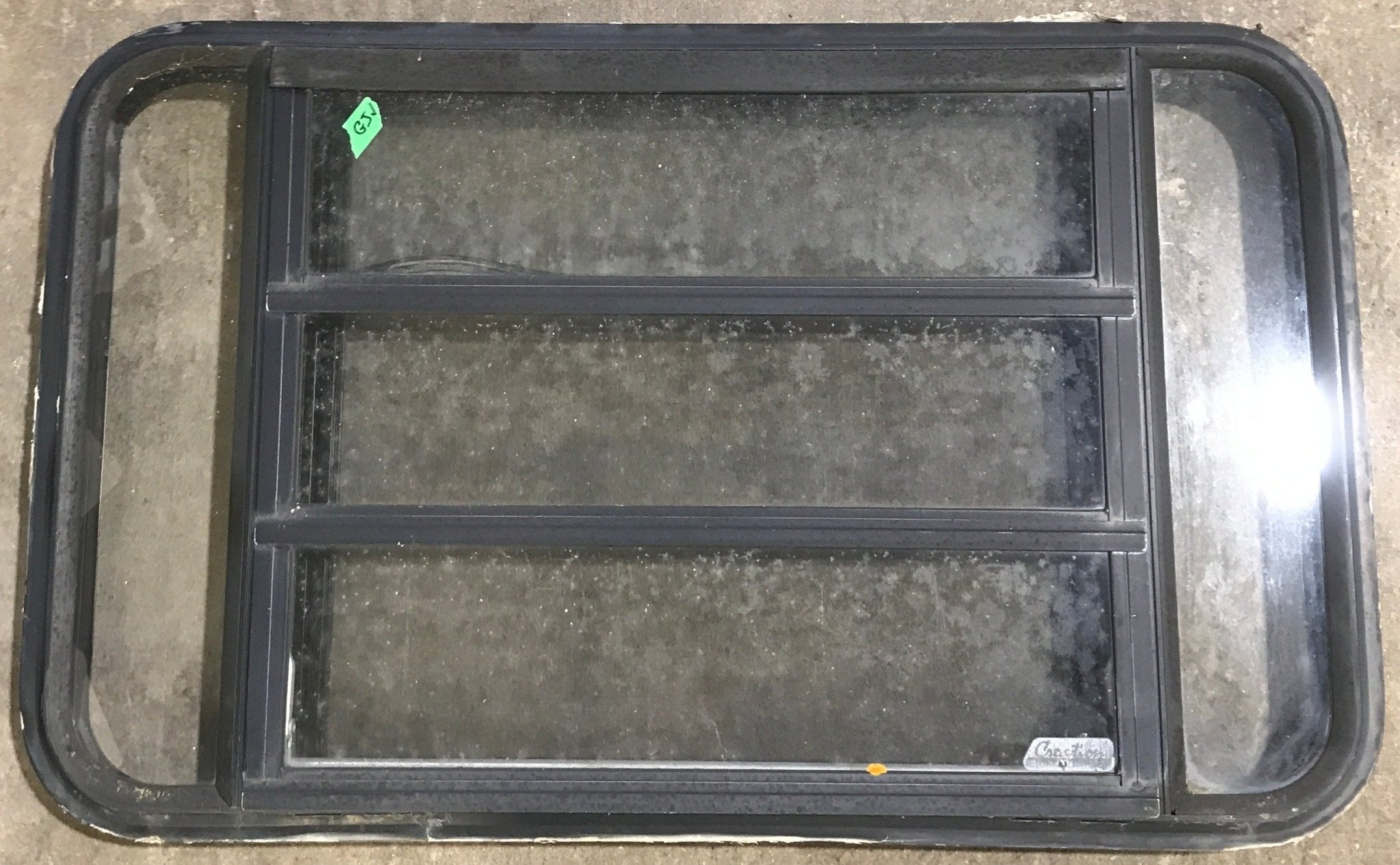 Used Black Radius Opening Window : 35 1/4" W x 21 1/4" H x 1 7/8" D - Young Farts RV Parts