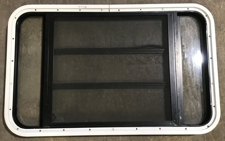 Used Black Radius Opening Window : 35 1/4" W x 21 1/4" H x 1 7/8" D - Young Farts RV Parts