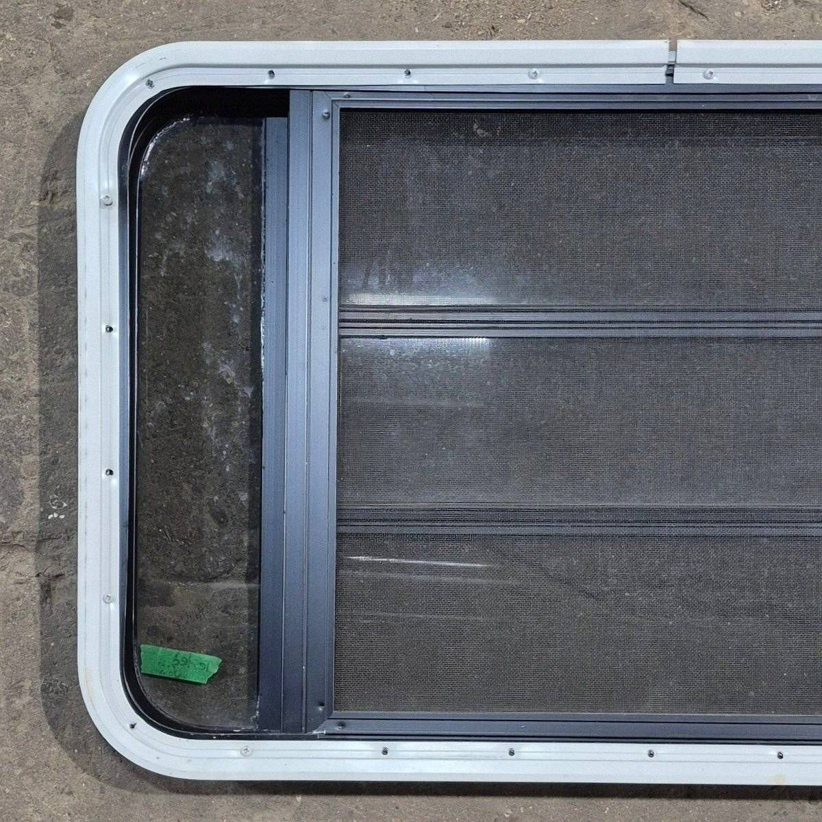 Used Black Radius Opening Window - 35 1/8