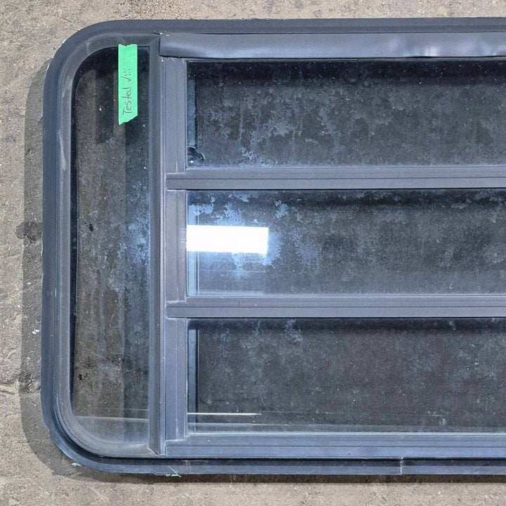 Used Black Radius Opening Window - 35 1/8" X 21 1/4" X 1 7/8" - Young Farts RV Parts