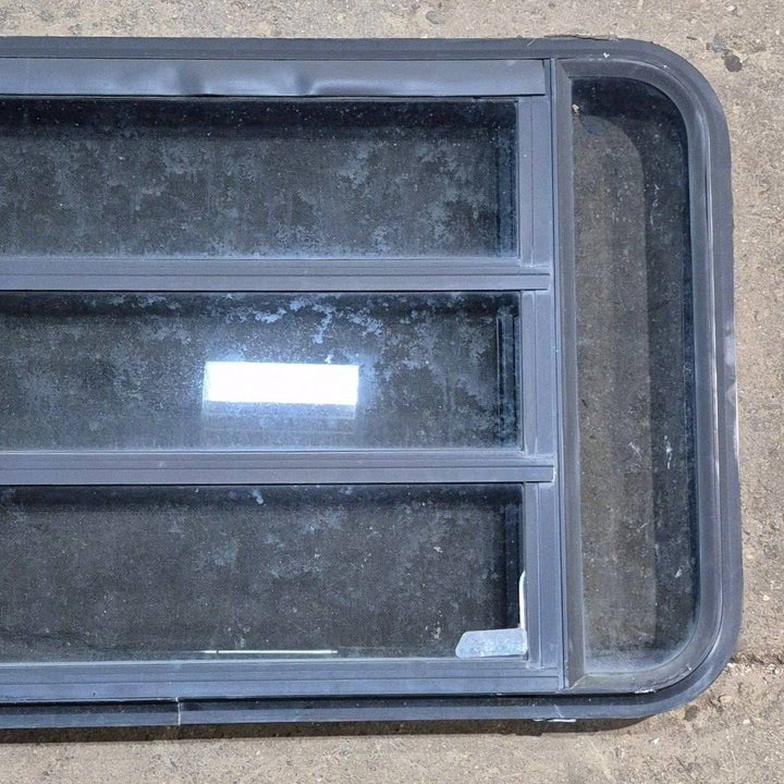 Used Black Radius Opening Window - 35 1/8" X 21 1/4" X 1 7/8" - Young Farts RV Parts