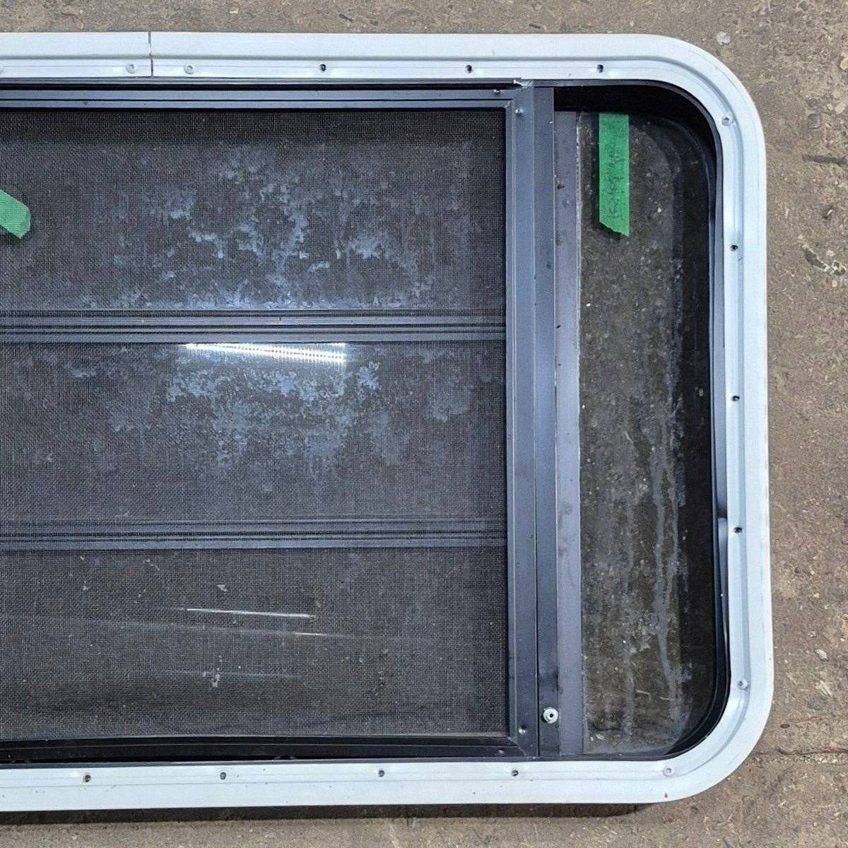 Used Black Radius Opening Window - 35 1/8