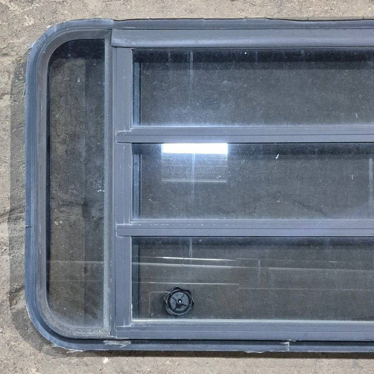 Used Black Radius Opening Window - 35 1/8" X 21 1/4" X 1 7/8" - Young Farts RV Parts