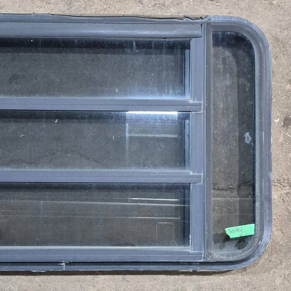 Used Black Radius Opening Window - 35 1/8