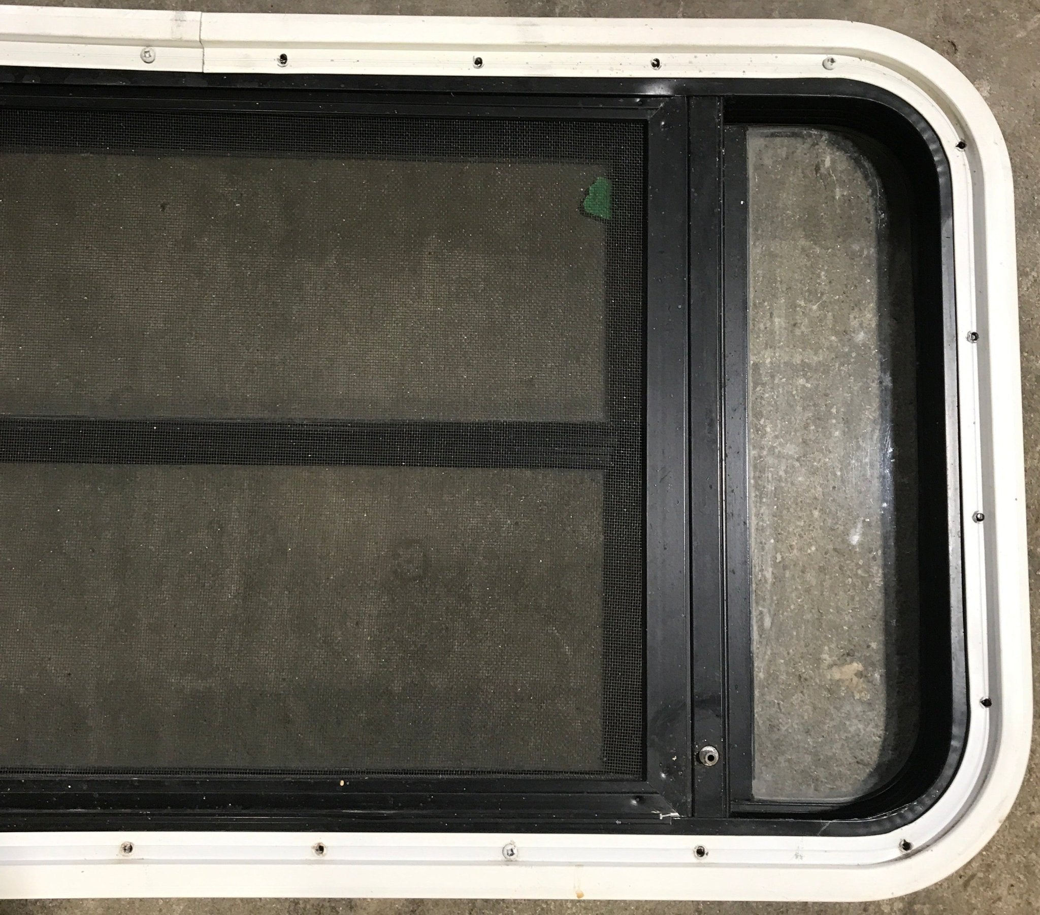 Used Black Radius Opening Window : 35" W x 17 1/4" H x 1 7/8" D - Young Farts RV Parts