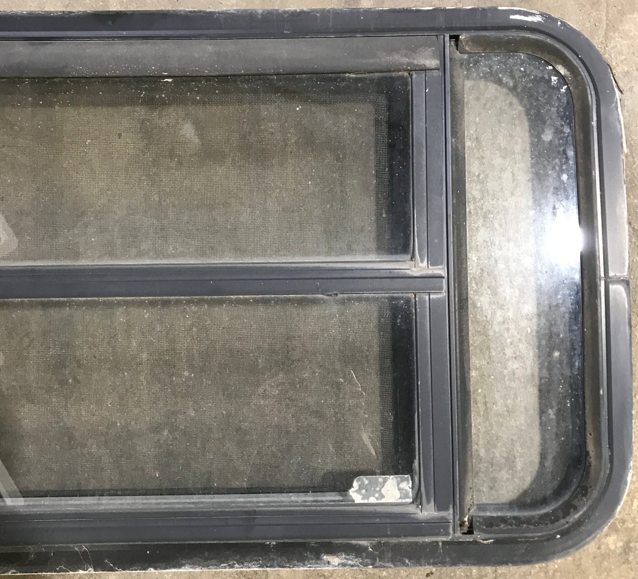 Used Black Radius Opening Window : 35" W x 17 1/4" H x 1 7/8" D - Young Farts RV Parts