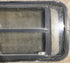 Used Black Radius Opening Window : 35" W x 17 1/4" H x 1 7/8" D - Young Farts RV Parts