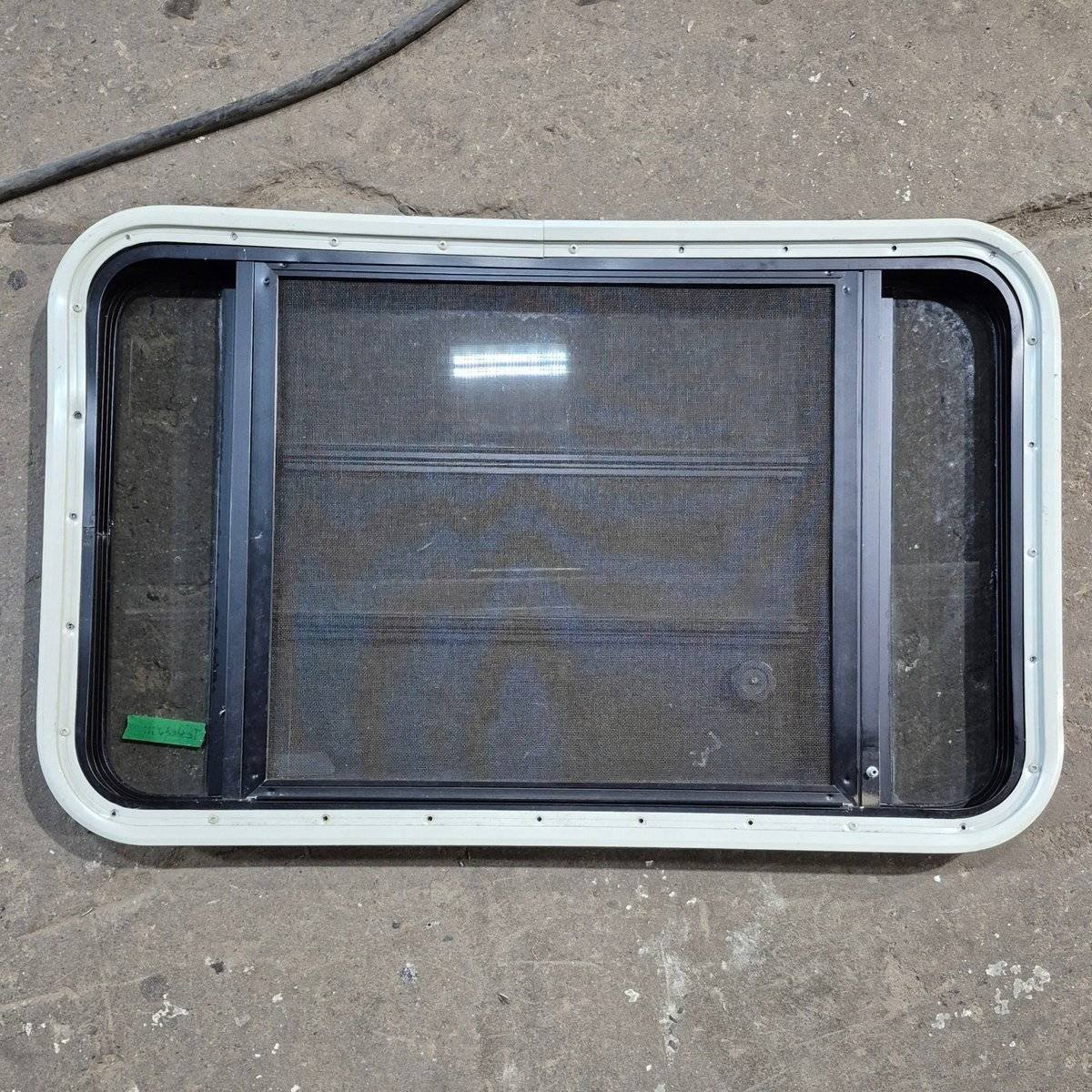 Used Black Radius Opening Window : 35" X 21.25" X 1.875" - Young Farts RV Parts