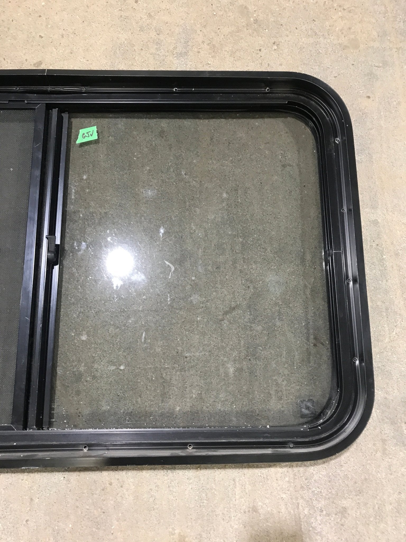 Used Black Radius Opening Window : 36 1/2" W x 22" H x 1 7/8" - Young Farts RV Parts